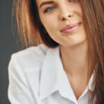 Portrait of young beautiful woman that posing for the camera in the studio.